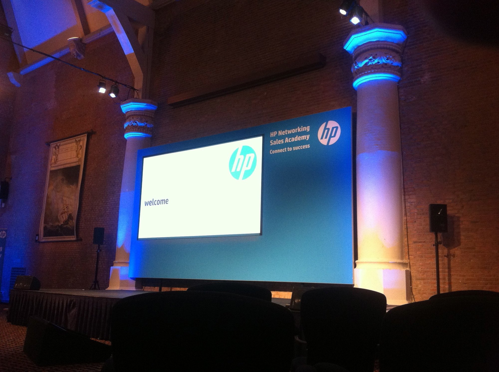 HP Networking Sales Academy event stage with welcome screen, branded set design and conference AV support by Bano Event Technology HP Networking Sales Academy event stage with welcome screen, branded set design and conference AV support by Bano Event Technology