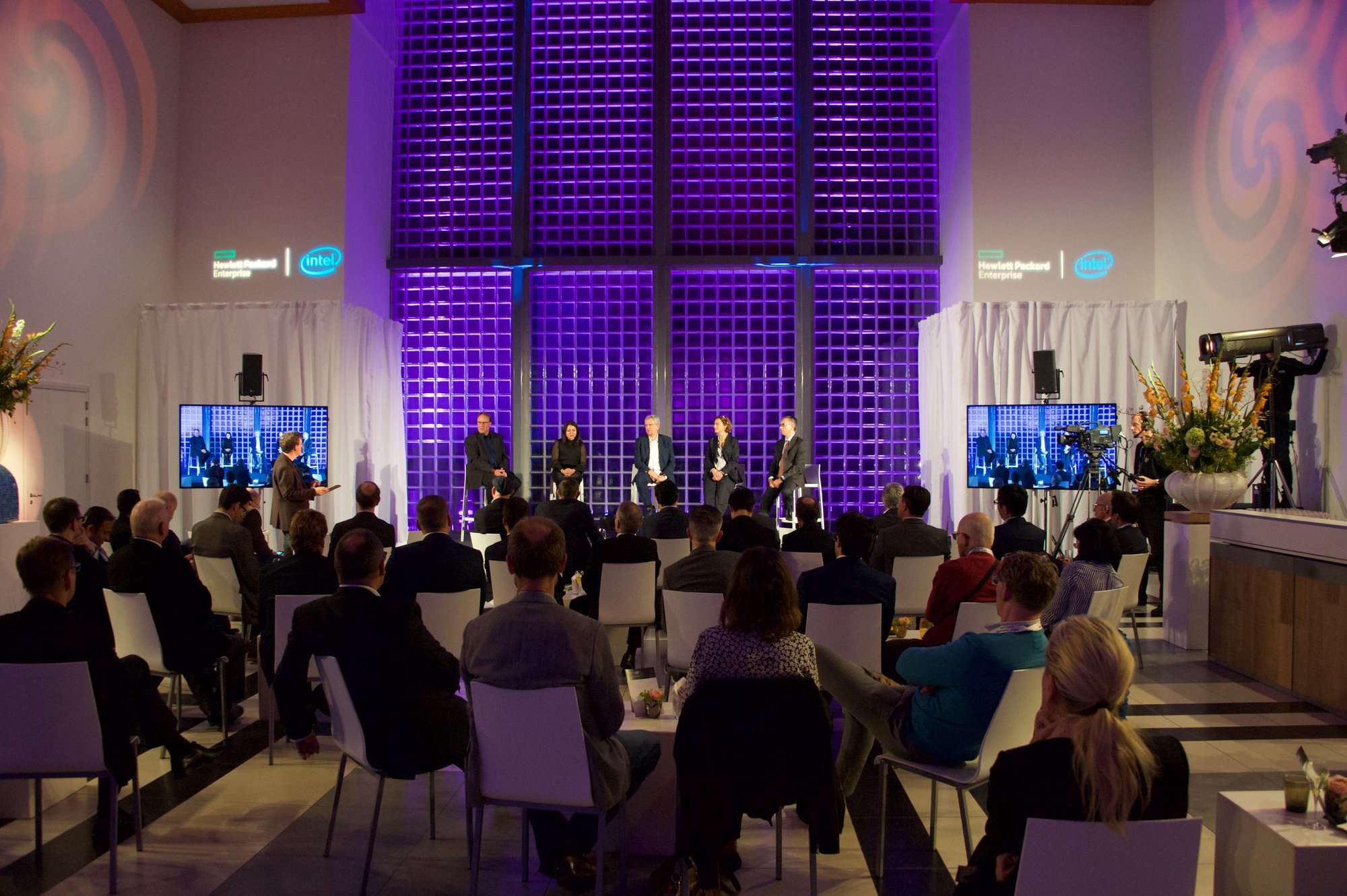 Corporate panel event for Hewlett Packard Enterprise and Intel with seated audience, stage lighting and live presentation setup by Bano Event Technology Corporate panel event for Hewlett Packard Enterprise and Intel with seated audience, stage lighting and live presentation setup by Bano Event Technology